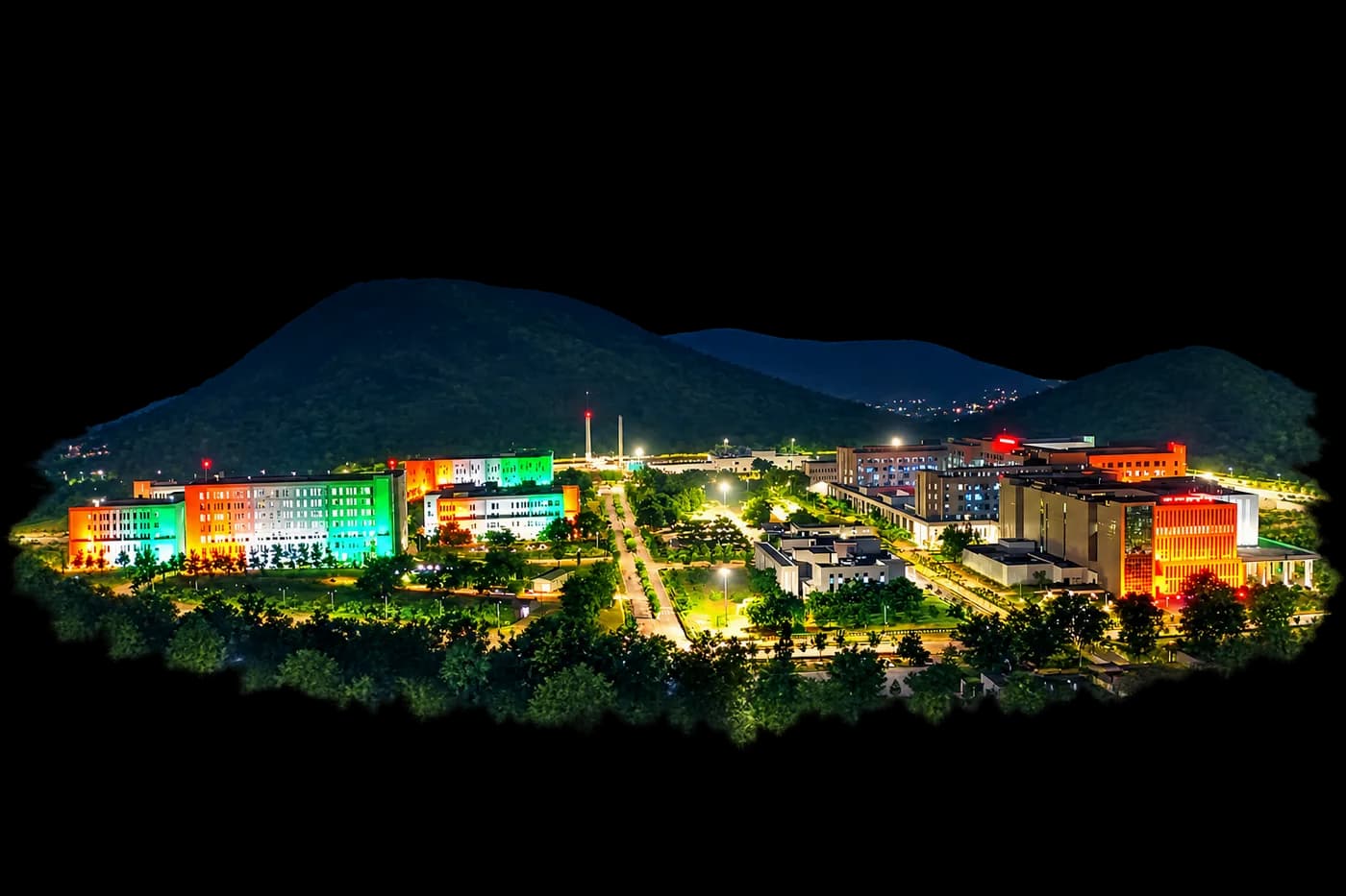 AIIMS Mangalagiri campus at night with tricolour lighting